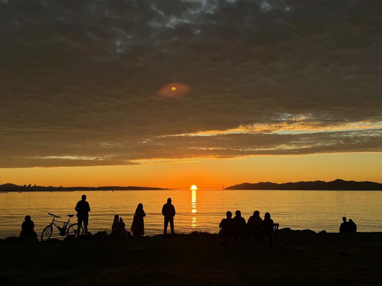 The sunset through the Golden Gate Sunday night, seen from Cesar Chavez Park.